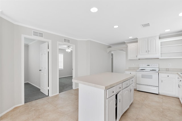 kitchen featuring white cabinets, open shelves, visible vents, and electric stove
