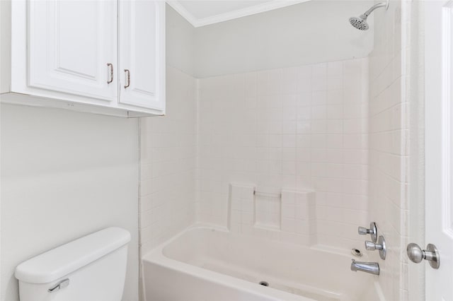 bathroom featuring ornamental molding, bathtub / shower combination, and toilet