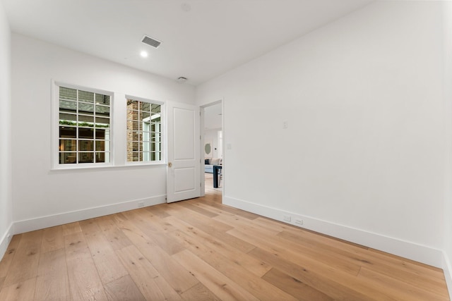 2530 Stanmore Dr, Houston, TX 77019 - spare room with light wood-style floors, baseboards, and recessed lighting
