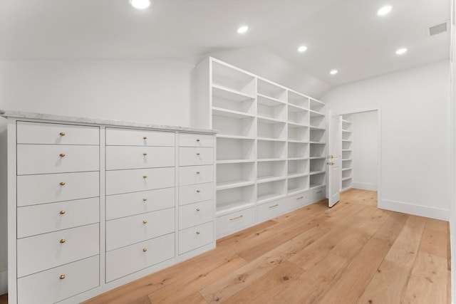 2530 Stanmore Dr, Houston, TX 77019 - spacious closet with lofted ceiling and light wood-type flooring