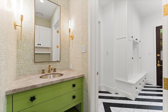 2530 Stanmore Dr, Houston, TX 77019 - bathroom featuring tile patterned floors and vanity