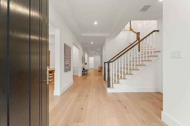 2530 Stanmore Dr, Houston, TX 77019 - foyer featuring baseboards, light wood-style floors, stairway, and recessed lighting
