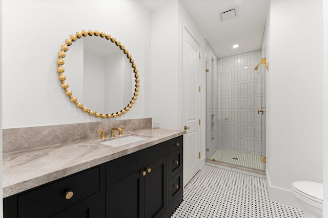 2530 Stanmore Dr, Houston, TX 77019 - bathroom featuring vanity, a shower stall, toilet, baseboards, and recessed lighting