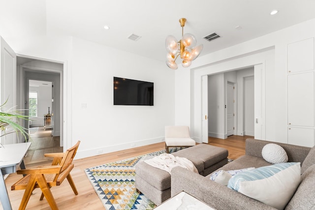 2530 Stanmore Dr, Houston, TX 77019 - living room with a chandelier, light wood-style floors, baseboards, and recessed lighting