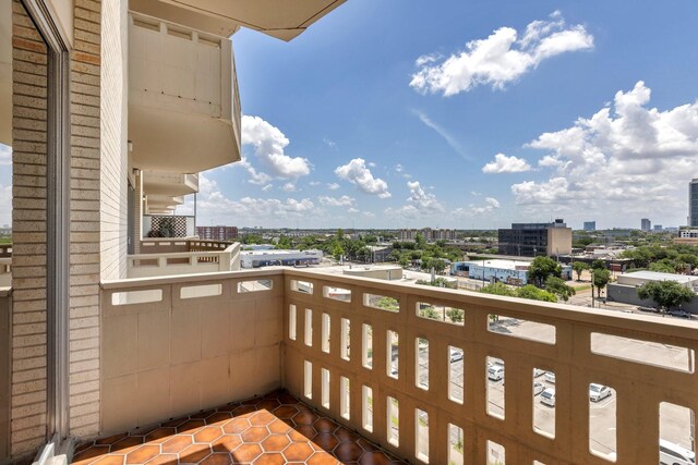 balcony featuring a city view