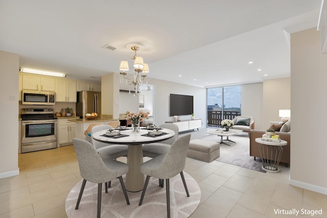 dining room featuring visible vents, light tile patterned flooring, baseboards, recessed lighting, and a notable chandelier