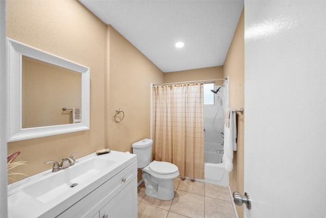 bathroom featuring vanity, tile patterned floors, shower / bath combination with curtain, and toilet