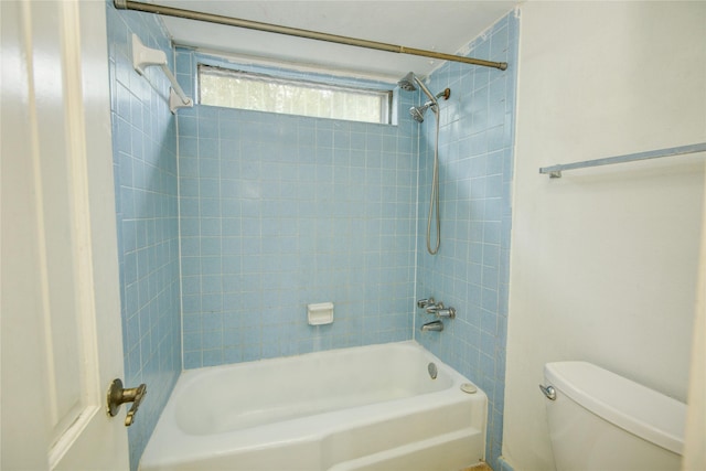 full bathroom featuring toilet and  shower combination