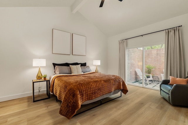 bedroom featuring access to outside, light wood finished floors, a ceiling fan, baseboards, and vaulted ceiling with beams