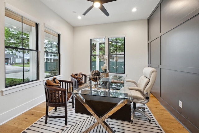 interior space featuring plenty of natural light, a ceiling fan, recessed lighting, and light wood-style flooring