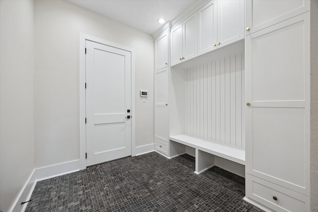 mudroom featuring baseboards and recessed lighting