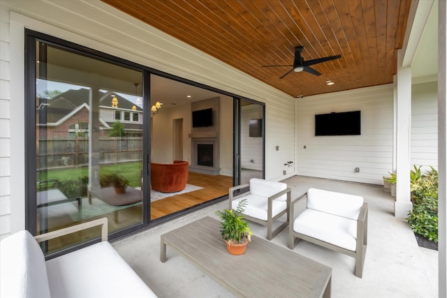exterior space featuring a ceiling fan