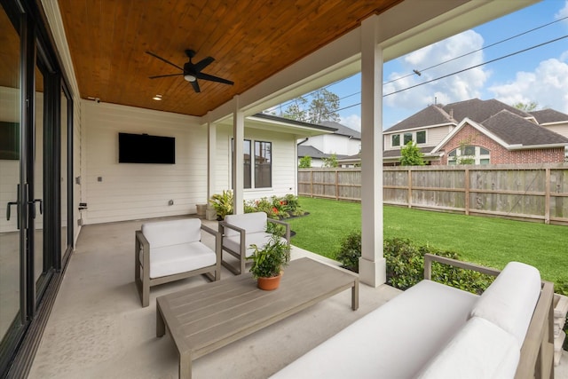 view of patio with ceiling fan, outdoor lounge area, and a fenced backyard