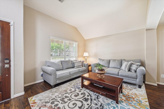 living area with baseboards, vaulted ceiling, and dark wood-type flooring