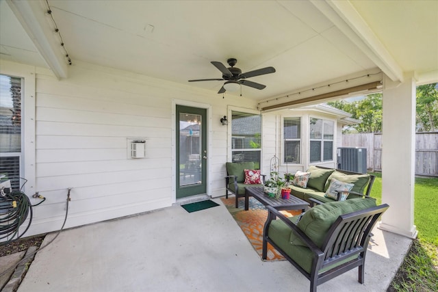 view of patio / terrace featuring a ceiling fan, fence, an outdoor hangout area, and central AC unit
