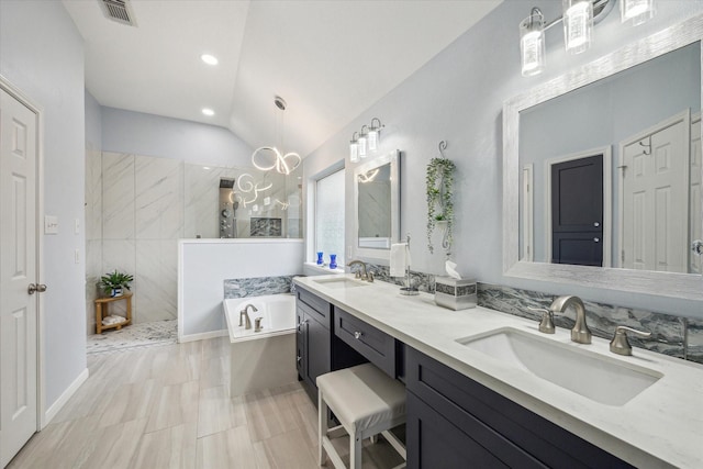 full bathroom featuring vaulted ceiling, visible vents, a sink, and a garden tub