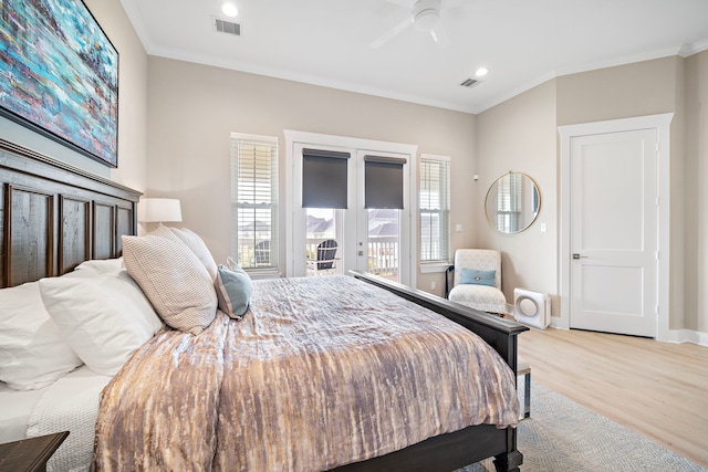 4014 Miramar Ct, Galveston, TX 77554 - bedroom with crown molding, visible vents, and wood finished floors