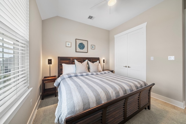4014 Miramar Ct, Galveston, TX 77554 - bedroom with a ceiling fan, baseboards, vaulted ceiling, visible vents, and a closet