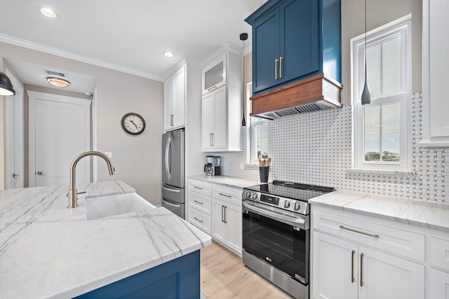4014 Miramar Ct, Galveston, TX 77554 - kitchen featuring a sink, appliances with stainless steel finishes, ornamental molding, and tasteful backsplash