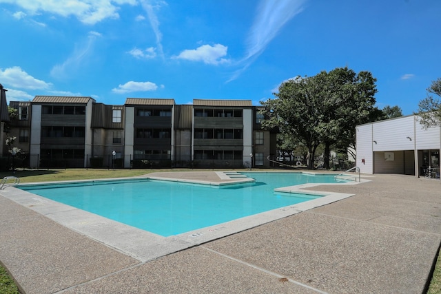 pool with a patio