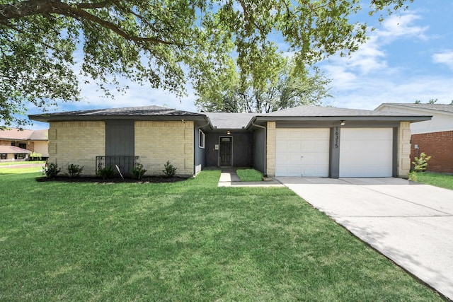 16315 Summer Dew Ln, Houston, TX 77095 - view of front facade with a garage, a front lawn, driveway, and brick siding