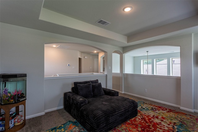 living area featuring visible vents, recessed lighting, baseboards, and carpet floors
