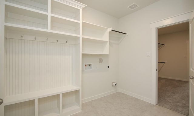 4439 Azalea Blossom Rd, Pinehurst, TX 77362 - clothes washing area featuring laundry area, visible vents, baseboards, hookup for a washing machine, and electric dryer hookup