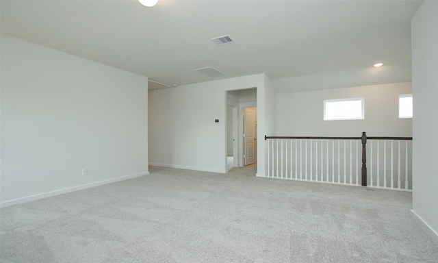 4439 Azalea Blossom Rd, Pinehurst, TX 77362 - carpeted spare room featuring visible vents and baseboards