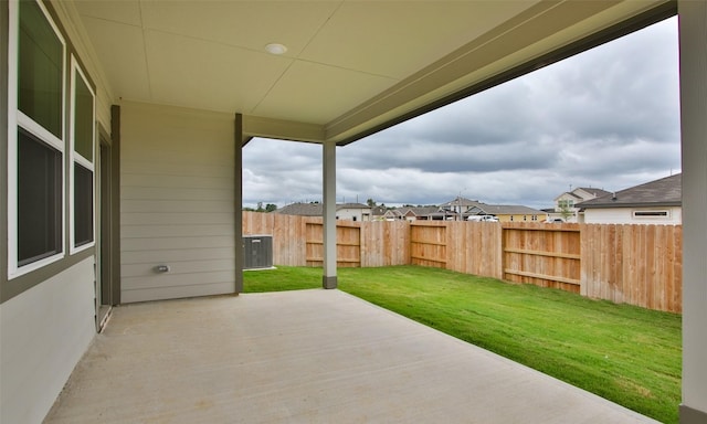 4439 Azalea Blossom Rd, Pinehurst, TX 77362 - view of patio / terrace with a fenced backyard and central air condition unit