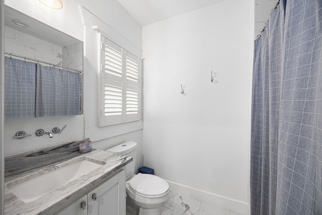 bathroom with vanity, marble finish floor, toilet, baseboards, and a shower with curtain