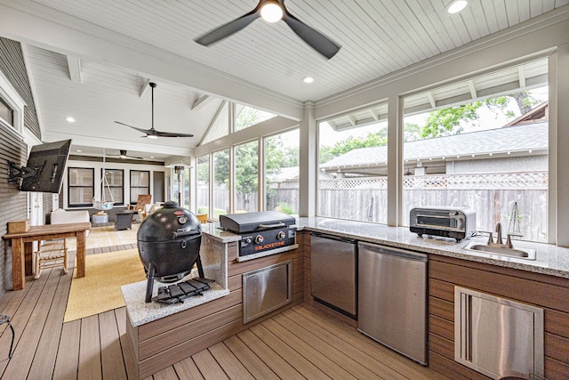 sunroom with wood ceiling, hardwood / wood-style flooring, a sink, a toaster, and lofted ceiling with beams