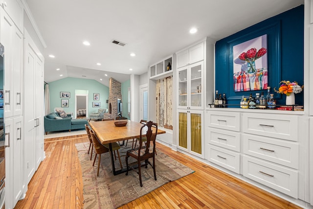 dining space featuring visible vents, recessed lighting, and light wood-style flooring