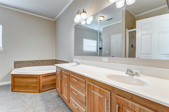 bathroom with visible vents, a sink, a shower stall, and ornamental molding