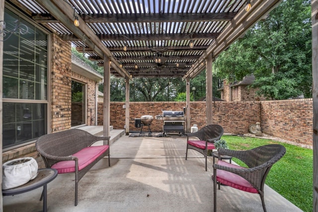 view of patio / terrace with a fenced backyard and a pergola
