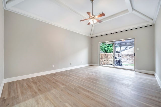 empty room with ceiling fan, baseboards, lofted ceiling, and light wood-type flooring