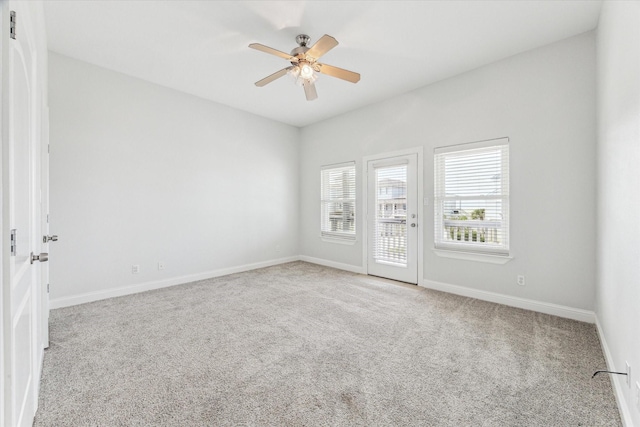 138 Isles End Rd, Tiki Island, TX 77554 - spare room featuring carpet flooring, baseboards, and a ceiling fan
