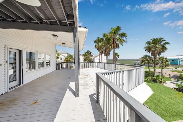 138 Isles End Rd, Tiki Island, TX 77554 - deck featuring a lawn