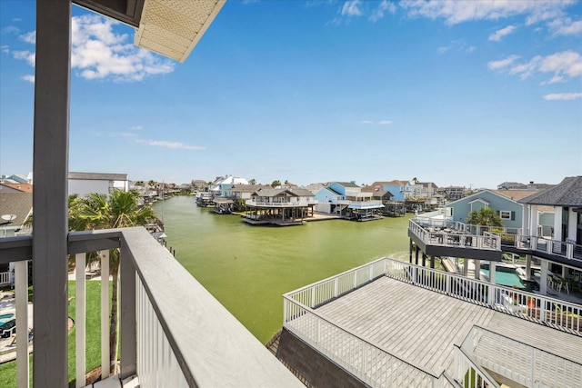 138 Isles End Rd, Tiki Island, TX 77554 - dock featuring a water view, a residential view, and a balcony