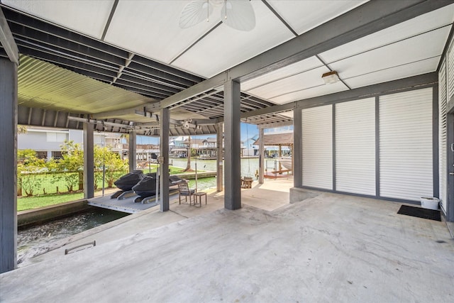 138 Isles End Rd, Tiki Island, TX 77554 - view of patio / terrace with a ceiling fan and a water view