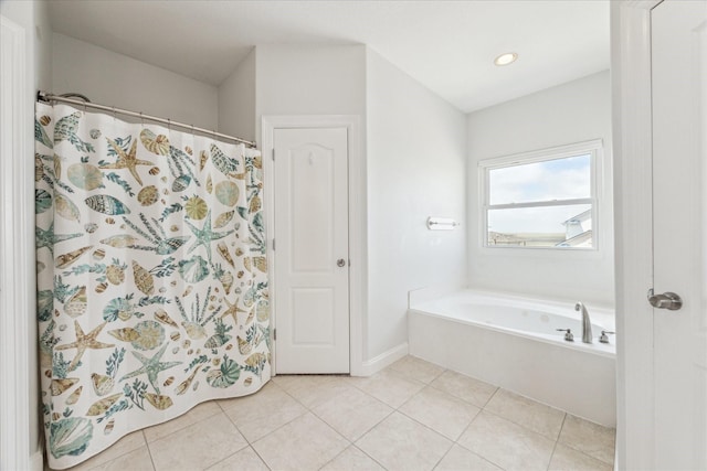 138 Isles End Rd, Tiki Island, TX 77554 - bathroom featuring a garden tub, tile patterned flooring, baseboards, recessed lighting, and a shower with shower curtain