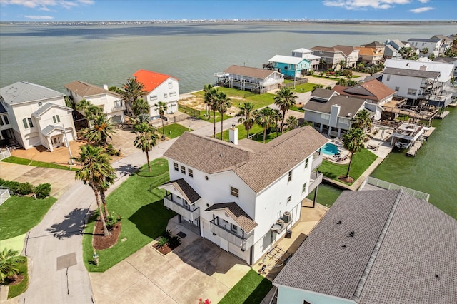 138 Isles End Rd, Tiki Island, TX 77554 - aerial view of residential area featuring a nearby body of water