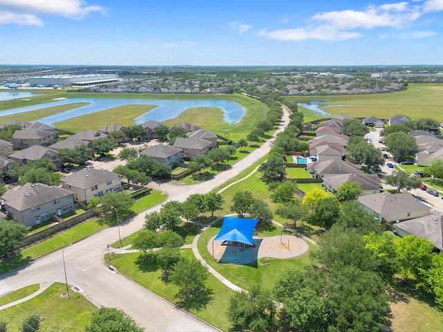 aerial view featuring a water view and a residential view