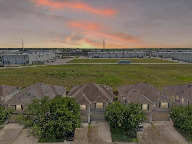 aerial view at dusk with a residential view