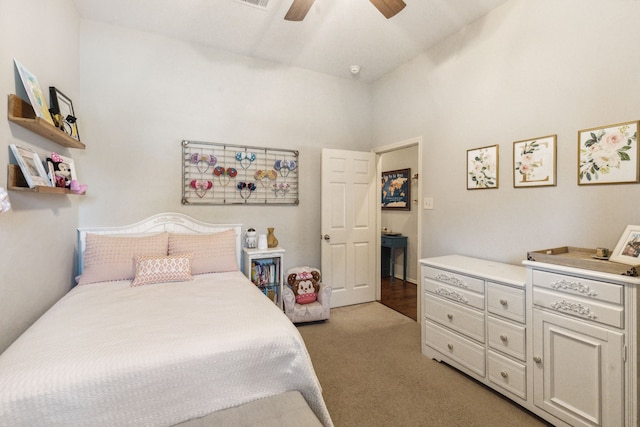 bedroom featuring a ceiling fan and light carpet