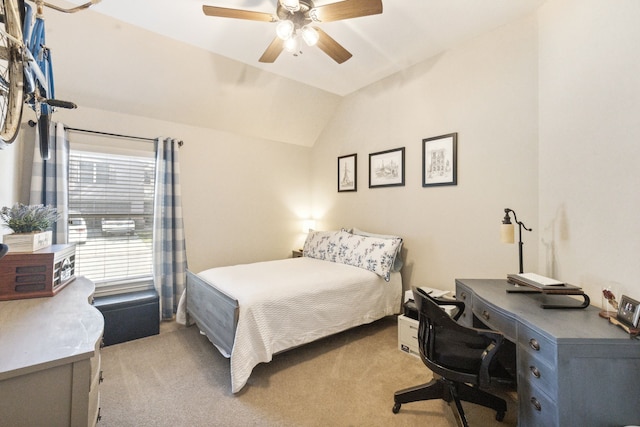 carpeted bedroom featuring ceiling fan and lofted ceiling