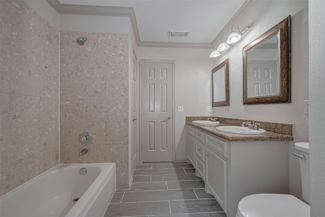 10310 Sable Trail Ln, Houston, TX 77064 - bathroom featuring toilet, double vanity, and bathtub / shower combination