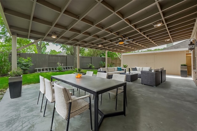 10310 Sable Trail Ln, Houston, TX 77064 - view of patio / terrace with an outdoor living space, outdoor dining space, and a fenced backyard