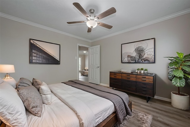 10310 Sable Trail Ln, Houston, TX 77064 - bedroom with ornamental molding, wood finished floors, baseboards, and a ceiling fan