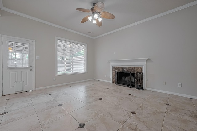 10310 Sable Trail Ln, Houston, TX 77064 - unfurnished living room featuring ornamental molding, ceiling fan, a tiled fireplace, light tile patterned floors, and baseboards