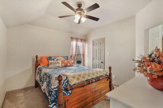 bedroom with baseboards, ceiling fan, vaulted ceiling, and light carpet